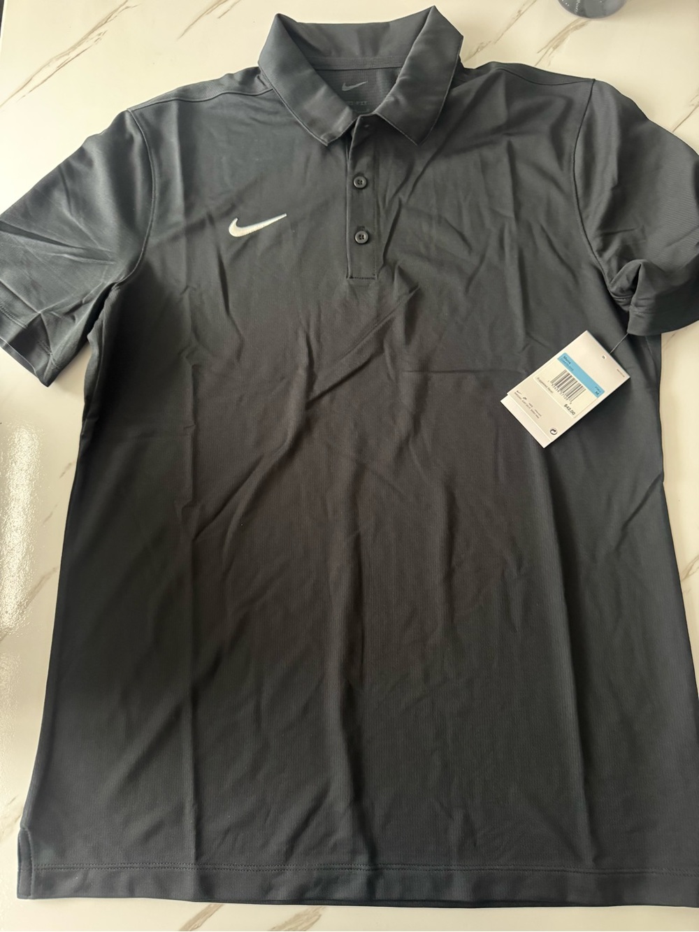 Nike Men’s Black Polo with White Swoosh
